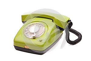 Green telephone retro style on white background. Vintage phone handset receiver