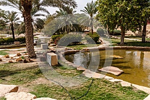 Green terraces and artificial ponds of Al Bujairi Park, Riyadh, Saudi Arabia photo