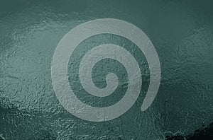 Green textured background creating dynamic visual interest