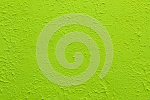 Green textured wall. Decorative plastering