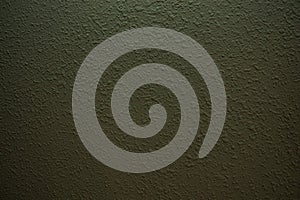 Green textured wall surface close up