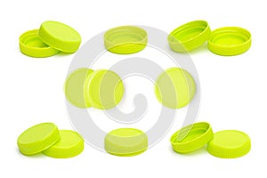 Green thin plastic bottle cap on white background