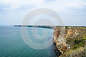 Green Thracian cliffs, Cape Kaliakra, Black sea water, bulgarian coastline