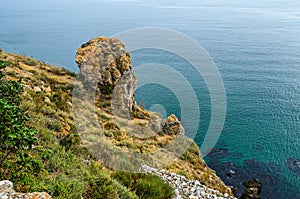 Green Thracian cliffs, Kaliakra Lighthouse, Black sea water, bulgarian coastline