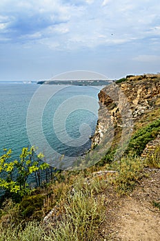 Green Thracian cliffs, Kaliakra Lighthouse, Black sea water, bulgarian coastline