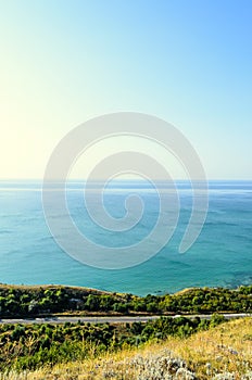 Green Thracian cliffs near blue clear water of Black Sea, bulgar