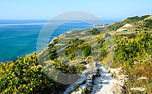 Green Thracian cliffs near blue clear water of Black Sea, rocky