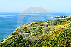 Green Thracian cliffs near blue clear water of Black Sea, rocky