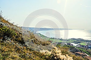 Green Thracian cliffs near blue clear water of Black Sea, rocky