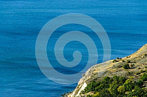 Green Thracian cliffs near blue clear water of Black Sea, rocky