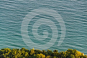 Green Thracian cliffs near blue clear water of Black Sea, rocky