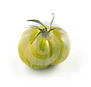 Green tiger tomato on white