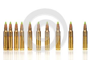 Green tip bullets ordered into the line