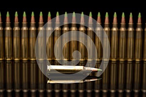 Green tip bullets ordered into the line