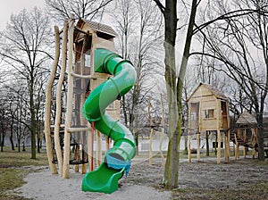 Green tobogan of a new rope center near Kamencove jezero alum lake outside the tourist season in czech city of Chomutov photo