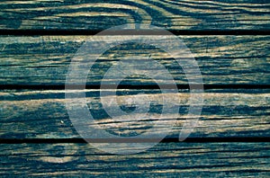 Green toned wood planks photo background. Rough timber table texture.