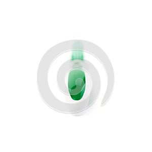 Green toothbrush isolated over white background