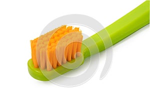 Green toothbrush on a white background. Full depth of field.