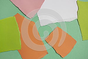 Green torn paper texture on mood board. Art background.