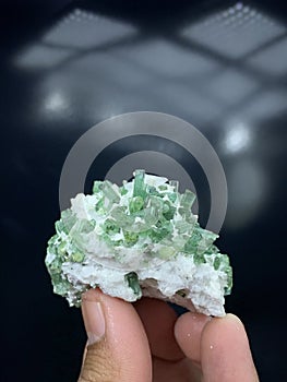 Green tourmaline bunch on matric minerals specimen from Afghanistan