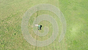 Green Tractor Hay Cutter Aerial View