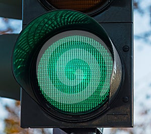 Green traffic light close up