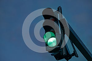 Green traffic light in Daugavpils, evening