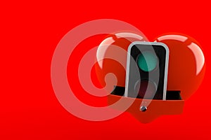 Green traffic light inside heart