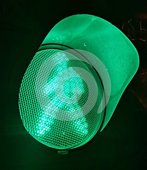 Green traffic lights in the night