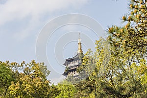 Green trees and Leifeng pagoda