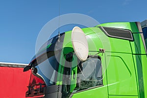 Green truck with satellite dish
