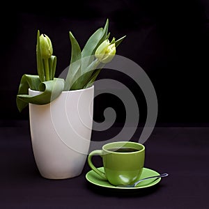 Green tulips and coffee