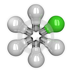 ï»¿Green tungsten light bulb among white ones lying radially