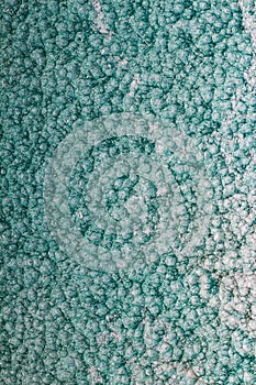 Green or turquoise hammered metal background,abstract metalic te