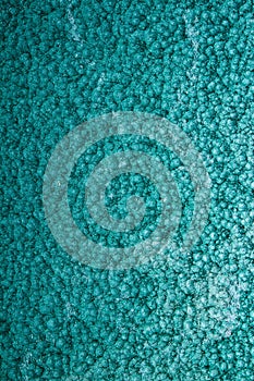 Green or turquoise hammered metal background,abstract metalic texture, sheet of metal surface painted with hammer paint