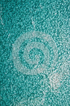 Green or turquoise hammered metal background,abstract metalic texture, sheet of metal surface painted with hammer paint