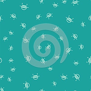 Green UFO flying spaceship icon isolated seamless pattern on green background. Flying saucer. Alien space ship