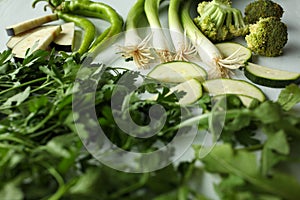 Green vegetables: parsley, onion, broccoli, zucchini, paprika
