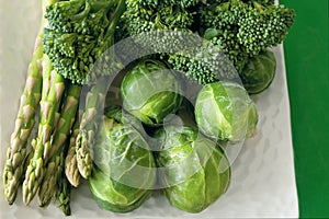 Green vegetables on white plate