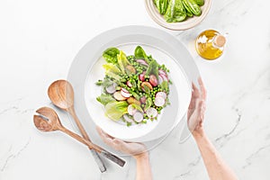 Green vegetarian potato and asparagus salad, top-down view