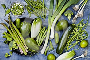 Green veggies group. Vegetarian dinner ingredients. Green vegetables variety. Overhead, flat lay, top view,