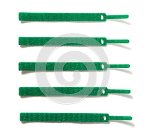 green velcro cable ties on A white background