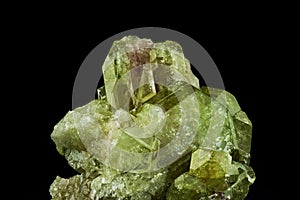 green vesuvianite (also known as idocrase) crystal photo