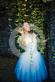 Green vines and ballet dancers in summer