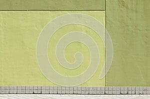 Green wall with baseboard