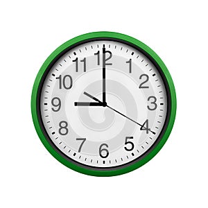 Green wall clock isolated on a white background.