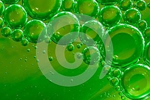 Green water, air and oil mixed for a bubbly effect