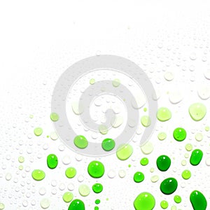 Green water drops on white background