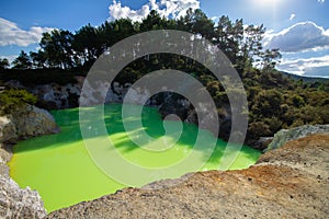 Green water pool in geothermal area very low PH water