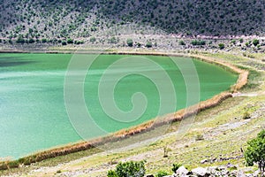 green water of volcanic Nar Lake in Cappadocia photo